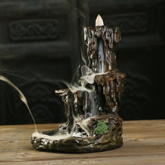 Backflow Incense Burner – cascading smoke on dark wood, tranquil