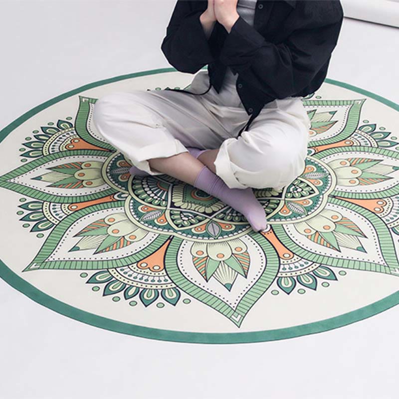 Tibetan Lotus Mandala Yoga mat held open showing full mandala print, sage green and orange, boho spiritual wall hanging