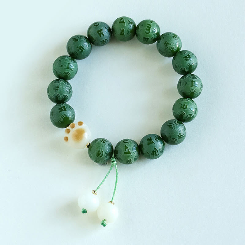 Bodhi Seed Om Mani Padme Hum Carved Bracelet - Obsidian and white jade yin-yang split bracelet, gold character bead, antiq...