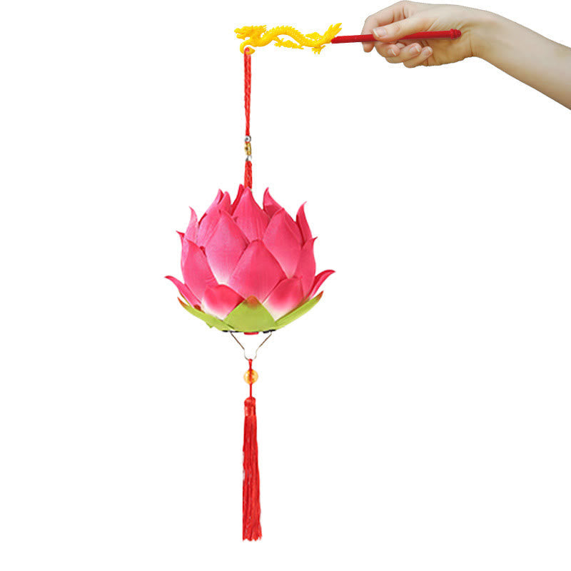DIY Lotus Dragon Lantern Tassel Lamp – Orange-gold lotus lantern held with chopsticks in hanfu sleeve, Nighttime heritage