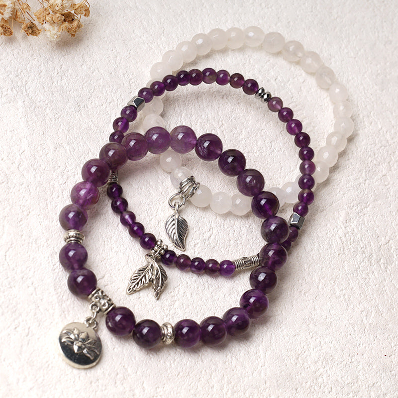 Crystal Lotus Bracelet – amethyst and moonstone strands with antique silver lotus medallion, boho bracelet