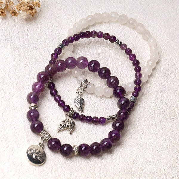 Crystal Lotus Bracelet – amethyst and moonstone strands with antique silver lotus medallion, boho bracelet
