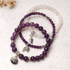 Crystal Lotus Bracelet – amethyst and moonstone strands with antique silver lotus medallion, boho bracelet