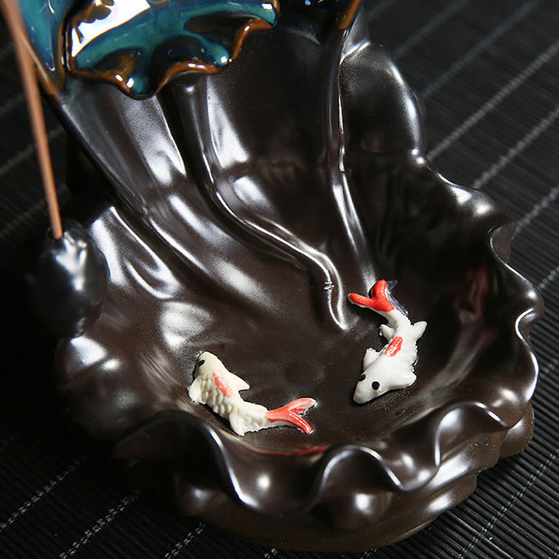 Backflow Incense Burner – Glazed teal tiers with flowing smoke, Mindful