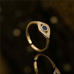 Evil Eye Copper Ring – Gold evil eye ring with blue sapphire, pave crystals, adjustable open band