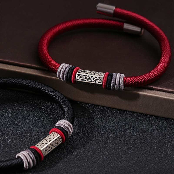 Om Mani Padme Hum Red Bracelet – Red and black cord pair on dark surface, etched silver beads, spiritual jewelry set