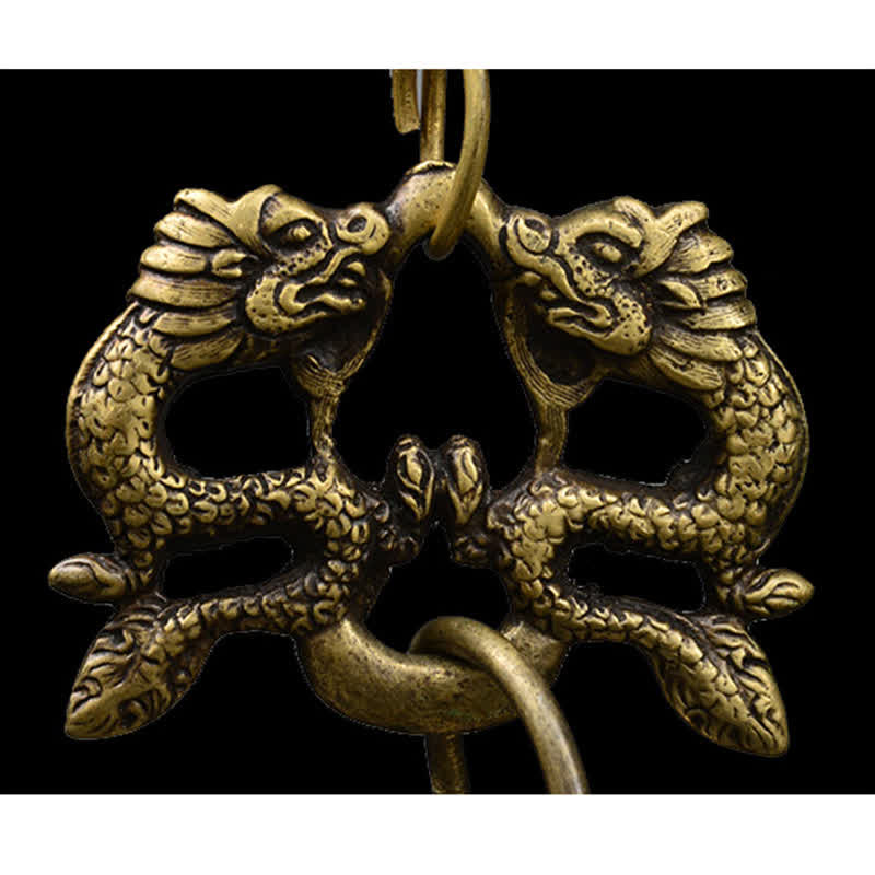 Tibetan Buddha Dragon Bell dual-panel detail showing exterior mantra engraving and interior central axis, sacred