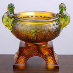 Liuli Crystal PiXiu Bowl – Amber-gold liuli treasure bowl with green PiXiu handles on wood table