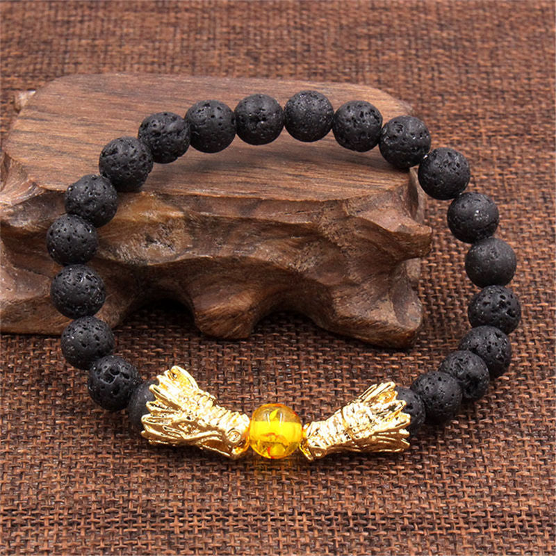 White Turquoise Lava Rock Dragon Bracelet – Lava beads gold dragons amber center on rustic wood burlap, Earthy
