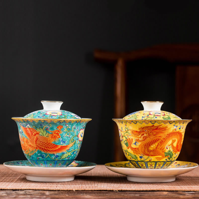 Dragon Phoenix Flower Gaiwan Tea Set – Turquoise and yellow gaiwans paired on bamboo mat, dragon-phoenix wedding set