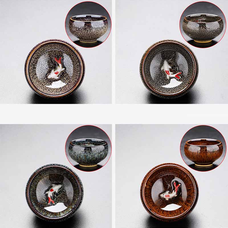 Jianzhan Koi Teacup – macro of silver oil spots surrounding koi motif, kiln change