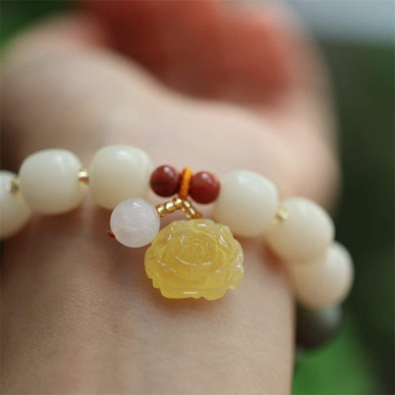 Gradient Bodhi Seed Amber Lotus Bracelet – amber lotus pendant on white jade beads wrist, Peaceful