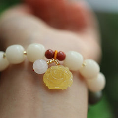 Gradient Bodhi Seed Amber Lotus Bracelet – amber lotus pendant on white jade beads wrist, Peaceful