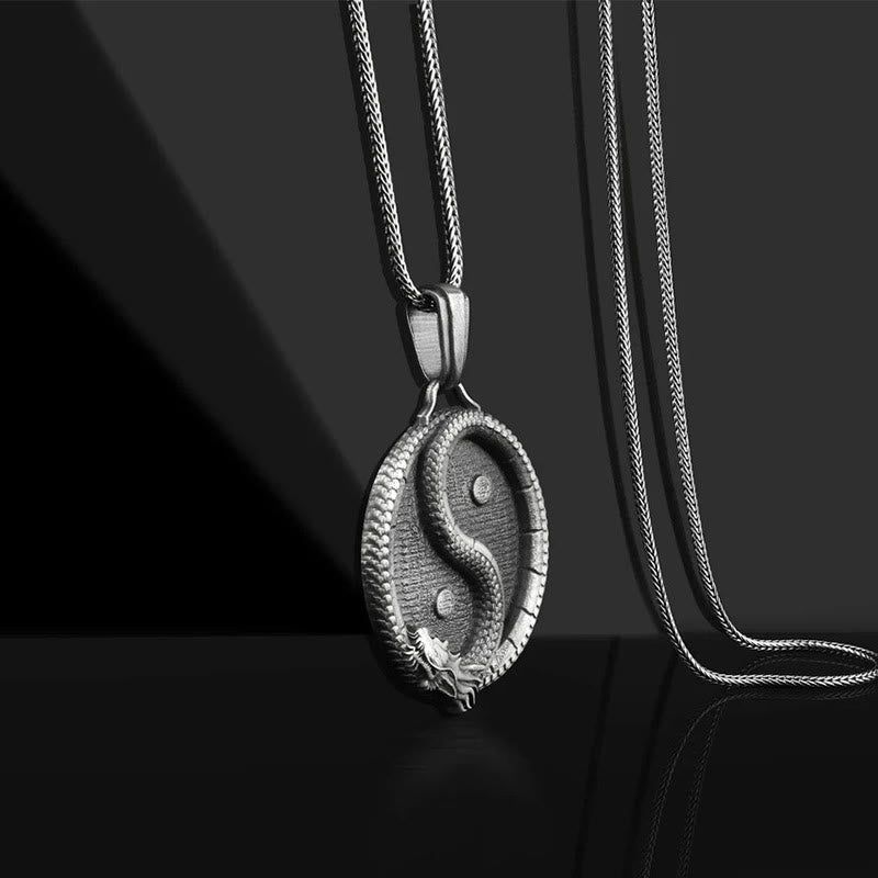 Yin Yang Dragon Pendant – Dragon head with scaled serpentine body on oxidized disc, Powerful