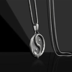 Yin Yang Dragon Pendant – Dragon head with scaled serpentine body on oxidized disc, Powerful