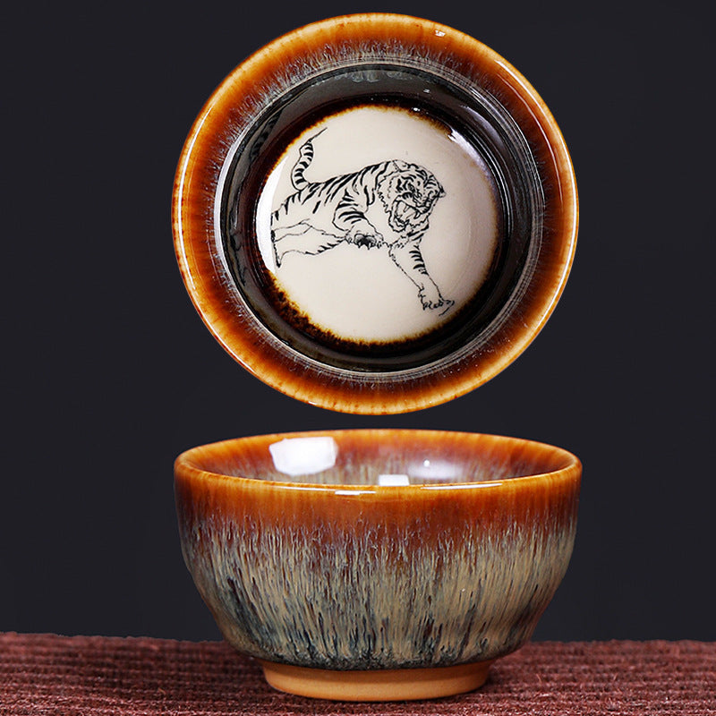 12 Zodiac Jian Zhan Teacup - Snake zodiac with coiled serpent interior medallion and silver-blue hare fur glaze, dual view