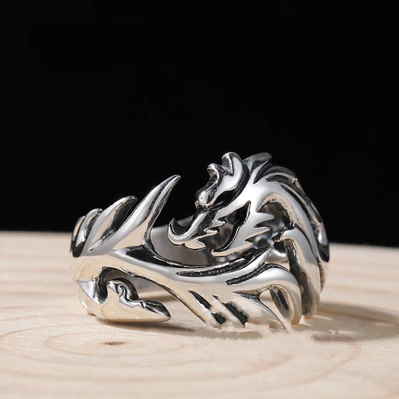 Dragon Pattern Protection Ring – tribal flame spikes on wood, Rebellious