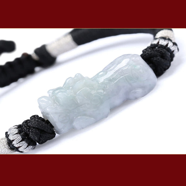 Natural Jade PiXiu Bracelet – extreme close-up white jade PiXiu carving, white background, jade prosperity
