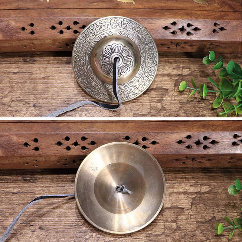 Tibetan Tingsha Bells – Split view of engraved exterior and polished interior, handcrafted copper bells
