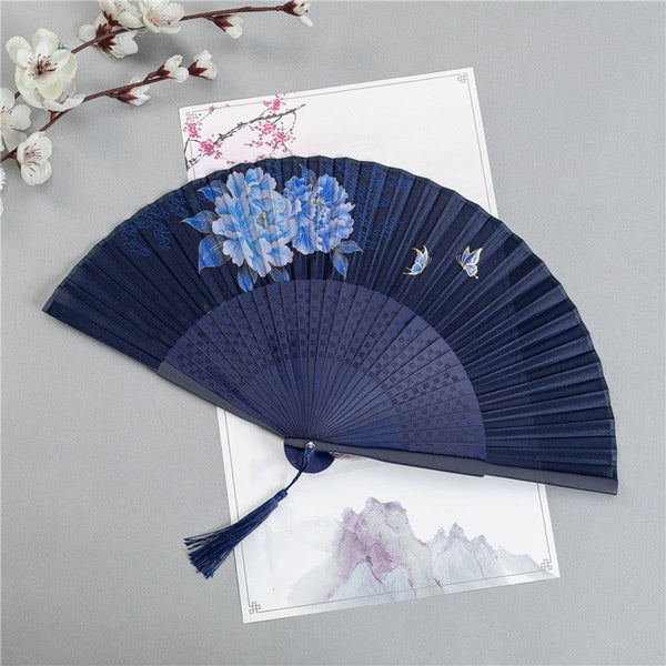 Peony Folding Fan – Navy blue fan with blue peonies and butterflies in gold accents, folding fan