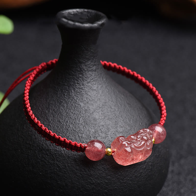 Strawberry Quartz PiXiu Red Bracelet – pink PiXiu beads red cord over black vase, love luck red string