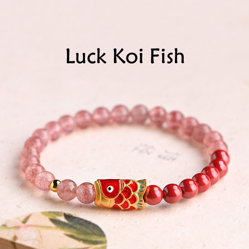 Strawberry Quartz Koi Bracelet – full bracelet laid flat showing pink quartz and red cinnabar koi beads