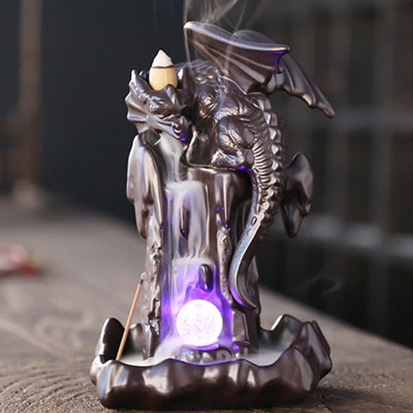 Nordic Dragon Backflow Incense Burner with smoke flowing down dark ceramic dragon on rustic wood, backflow incense