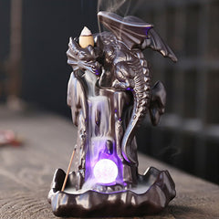 Nordic Dragon Backflow Incense Burner with smoke flowing down dark ceramic dragon on rustic wood, backflow incense