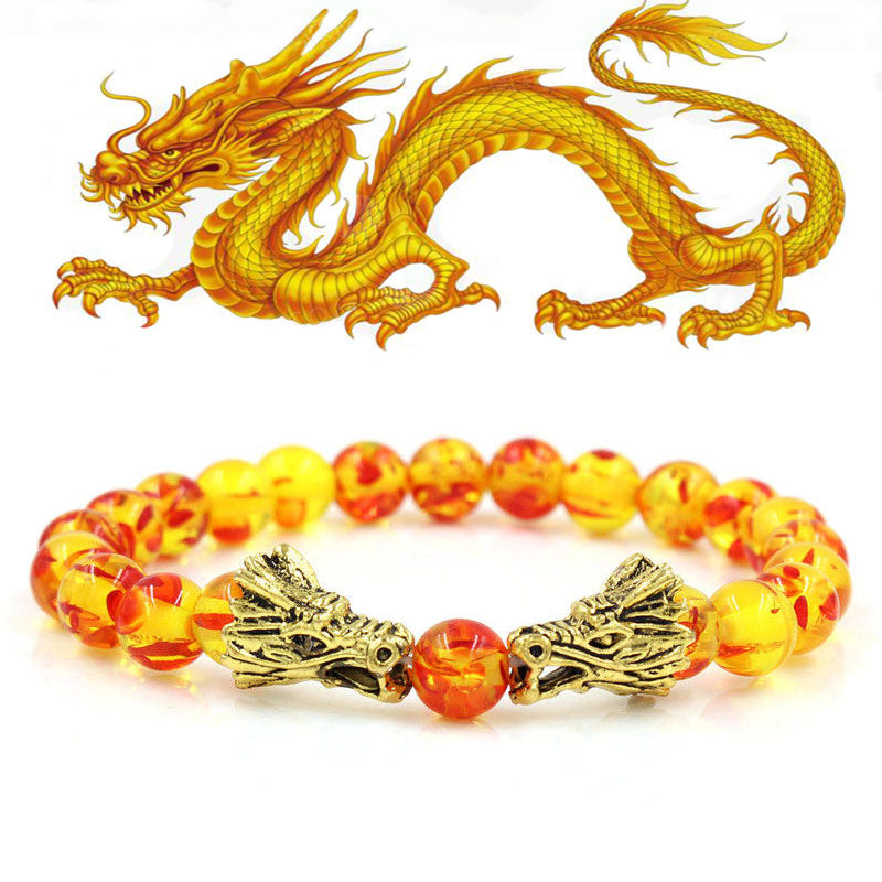 White Turquoise Lava Rock Dragon Bracelet – Amber bead bracelet with gold dragon heads warm fire tones, Vitality