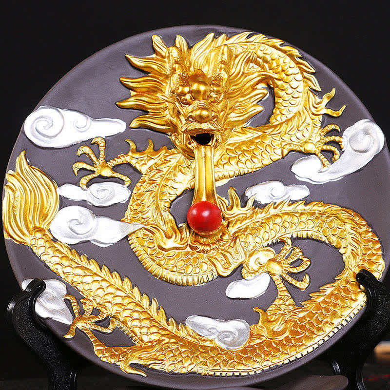 Golden Dragon Backflow Burner close-up, black background, red flaming pearl, carved cloud motifs, calm