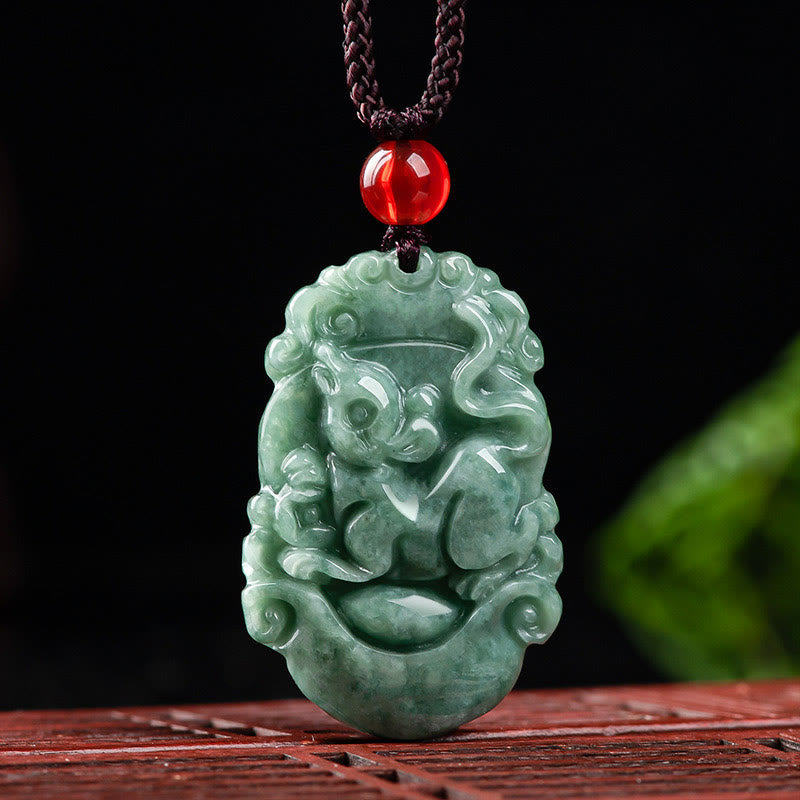 Jade Zodiac Prosperity Necklace – Rat zodiac carving against black background, frontal view, fortune
