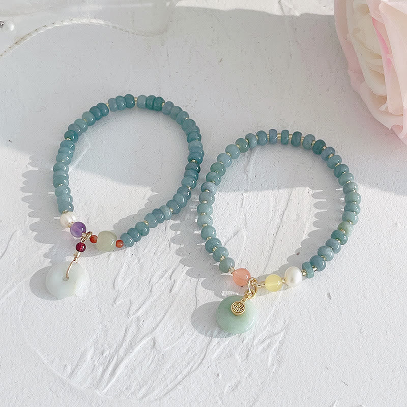 Hetian Jade Pearl Fu Gourd Money Bag Bracelet – Two jade bracelets with Fu charm and jade disc on white, fortune bracelet