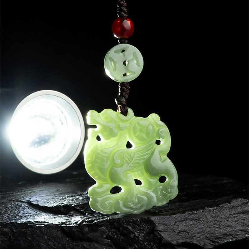 Jade Fortune Charm – Translucent green jade pixiu with 福 character bead lit by flashlight, fortune talisman