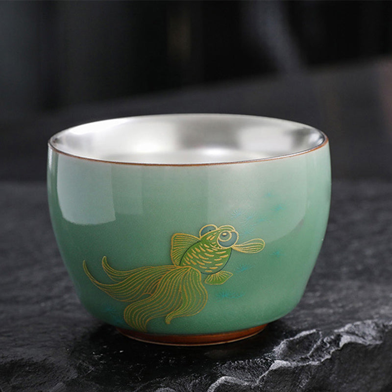 Butterfly Goldfish Teacup – overhead showing interior glaze and painted rim, tea cup