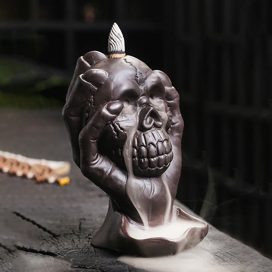 Ghost Hand Purple Clay Burner – two hands gripping skull with smoke from mouth, protection decor