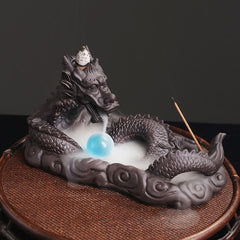 Dragon Incense Burner - coiled purple clay dragon with smoke waterfall, blue orb, meditative