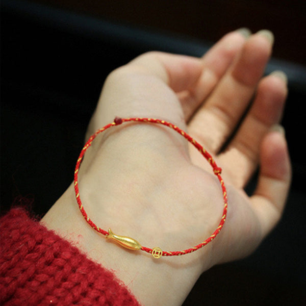 14K Gold Plated Koi Braided Bracelet – koi fish charm dangling from braided red string, gold plating detail, wrist