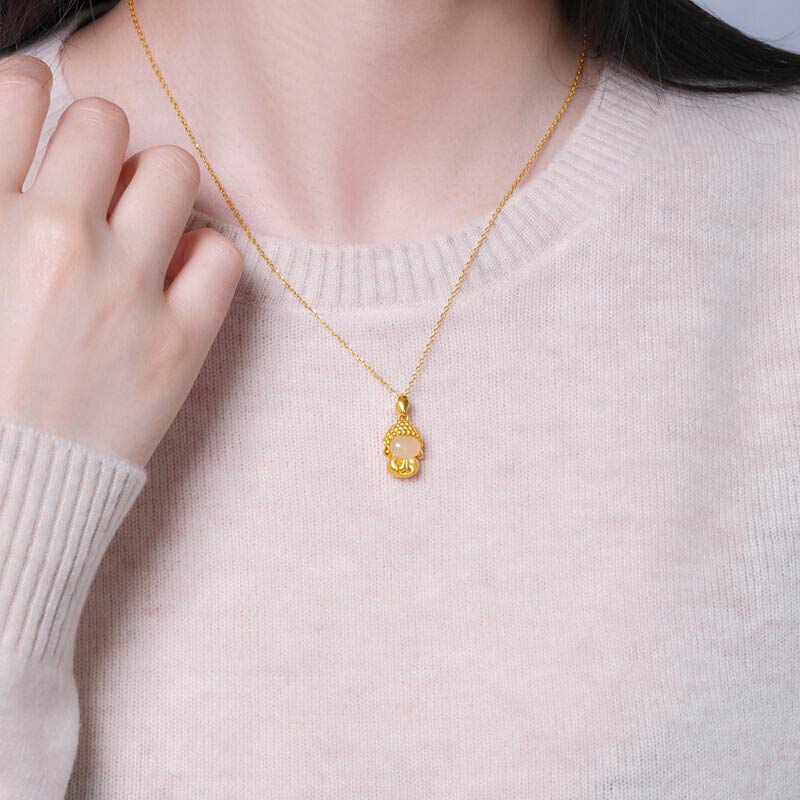White Jade Buddha Success Pendant Necklace – Worn on model with gold chain, lifestyle jewelry, success and serenity