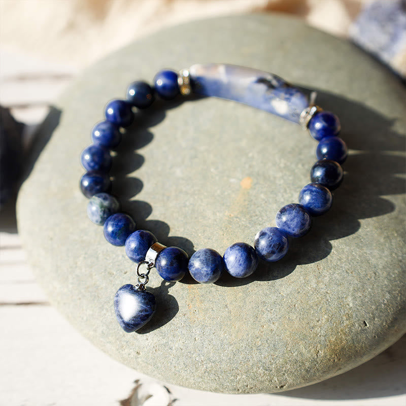Natural Multi-Stone Love Heart Healing Bracelet - Blue sodalite variant with deep royal blue beads, white marble veining, curved bar centerpiece, and heart charm