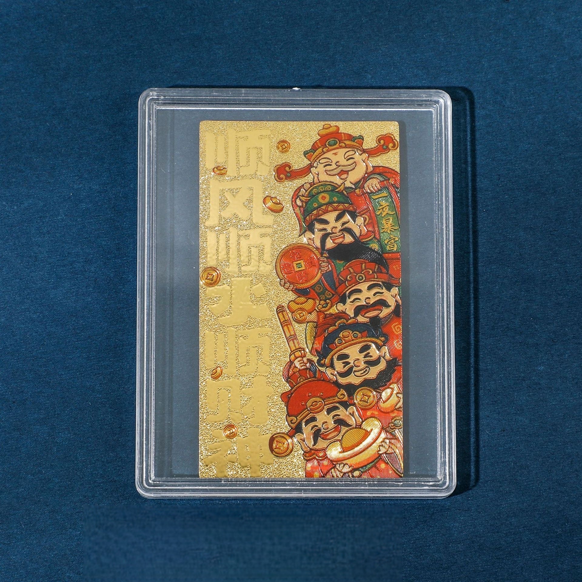 Gold leaf fortune sticker with wealth blessing design in display case