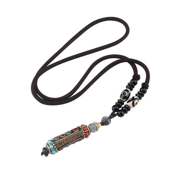 Wenge Wood Dzi Bead Mantra Necklace - White background shot of dzi bead cord with turquoise inlay pendant