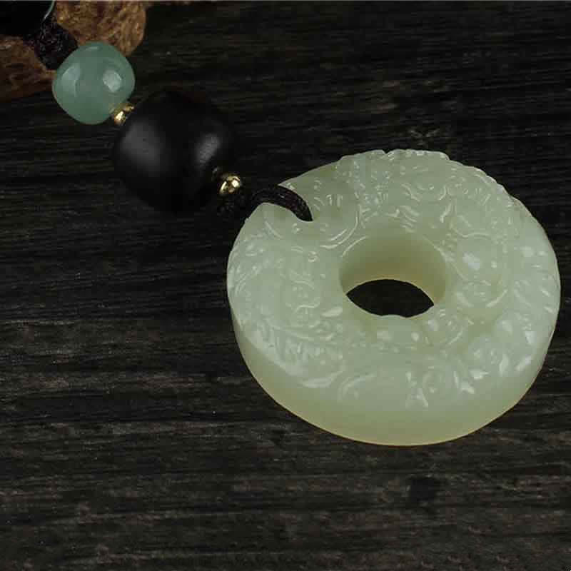 Jade PiXiu Peace Buckle Abundance Key Chain – Car key with jade peace buckle keychain on dark wood, gift idea