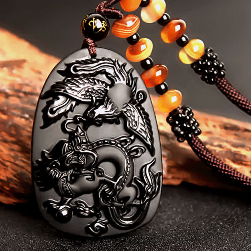 Black Obsidian Tiger Eye Dragon Phoenix Necklace – carved dragon-phoenix obsidian plaque with amber nuggets, balanced