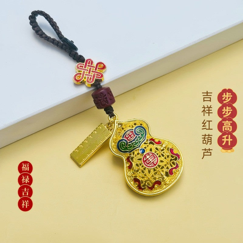 Gold enamel calabash keychain with Chinese knot, cinnabar bead and ruler charm, brown cord