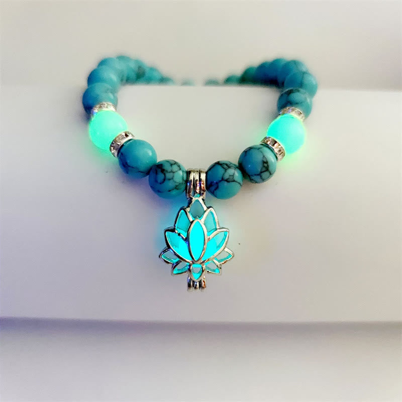 Tibetan Turquoise Glowstone Lotus Bracelet – turquoise beads with cyan glowing lotus pendant front view, turquoise glowstone