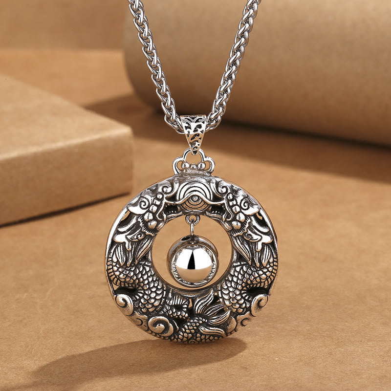 Double Dragon Bead Copper Pendant Necklace on kraft paper, antique silver finish, protective talisman