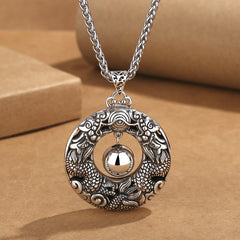 Double Dragon Bead Copper Pendant Necklace on kraft paper, antique silver finish, protective talisman