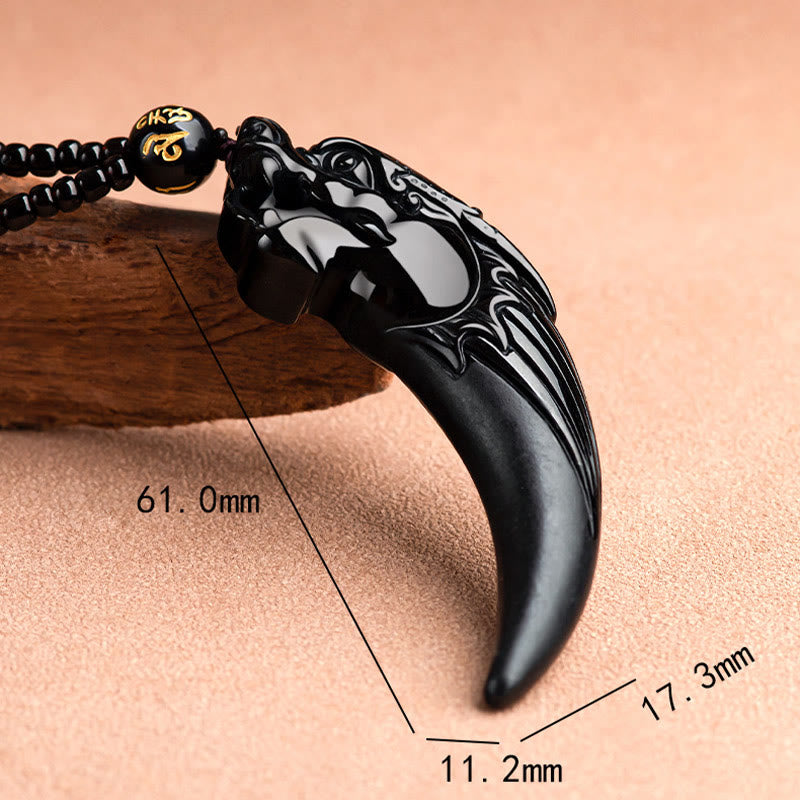 Black Jade Dragon Tooth Pendant – dimensional measurement shot 61mm, carved dragon head on obsidian fang, precise craft