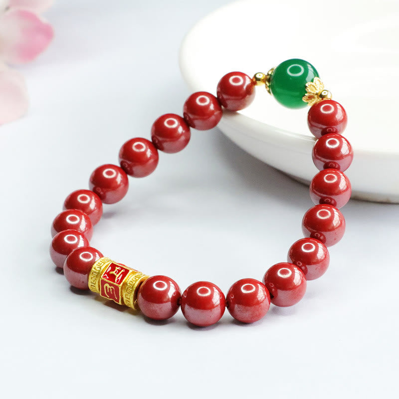 Cinnabar Agate Bracelet – On white ceramic dish, auspicious red bead bracelet