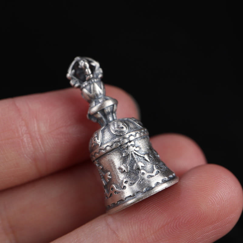 925 Silver Dorje Bell Pendant – Compact bell pendant held in hand showing floral engraving detail